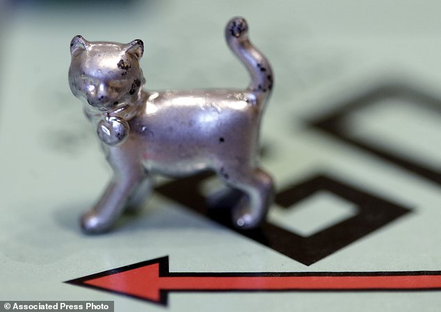 Modern image: Last year Hasbro Inc. added a cat token and retired the iron in a similar online stunt aimed at keeping the 79-year-old game fresh