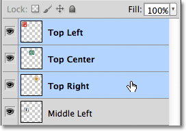 Selecting three layers at once in the Layers panel in Photoshop. 