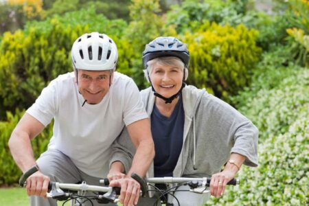 senior couple riding their bicycles
