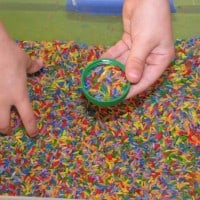 rainbow rice and bottle tops 7 sensory play ideas for kids